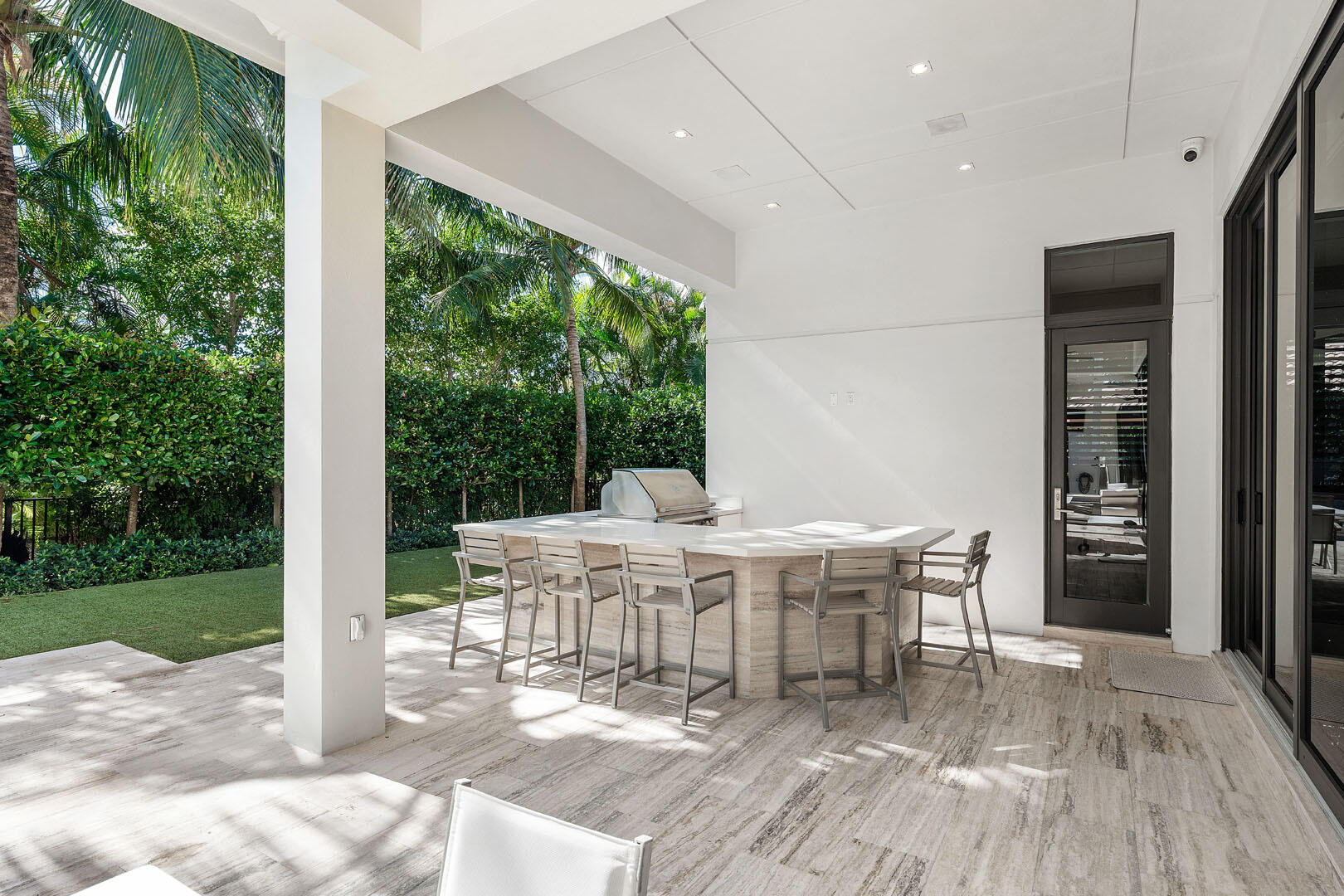 252 South Silver Palm Road Boca Raton, FL 33432 - Photo 34 of 90 a outdoor dining space with furniture and garden view
