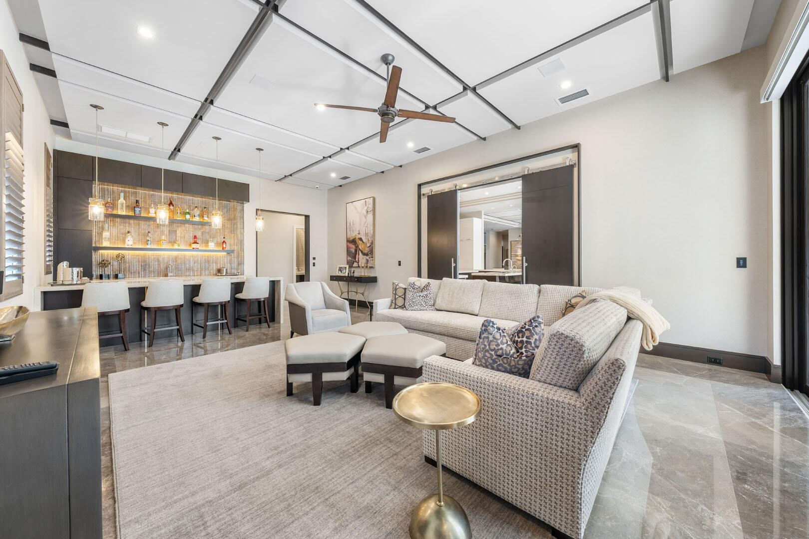 252 South Silver Palm Road Boca Raton, FL 33432 - Photo 38 of 90 a living room with furniture and a chandelier