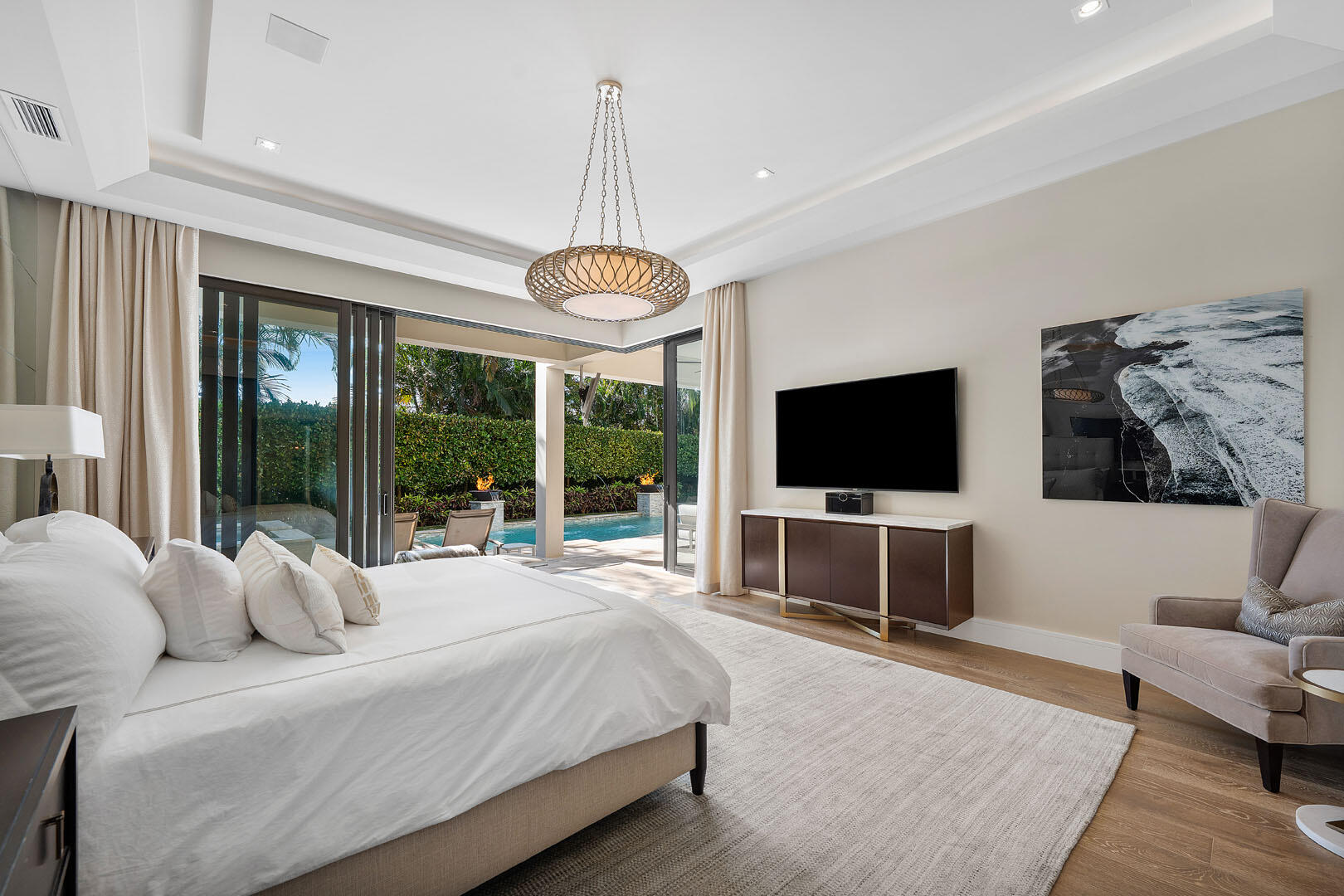 252 South Silver Palm Road Boca Raton, FL 33432 - Photo 47 of 90 a bedroom with a bed and a flat screen tv