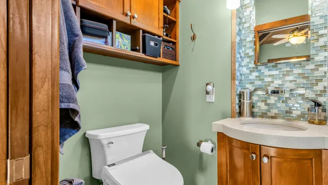 a bathroom with a sink and mirror