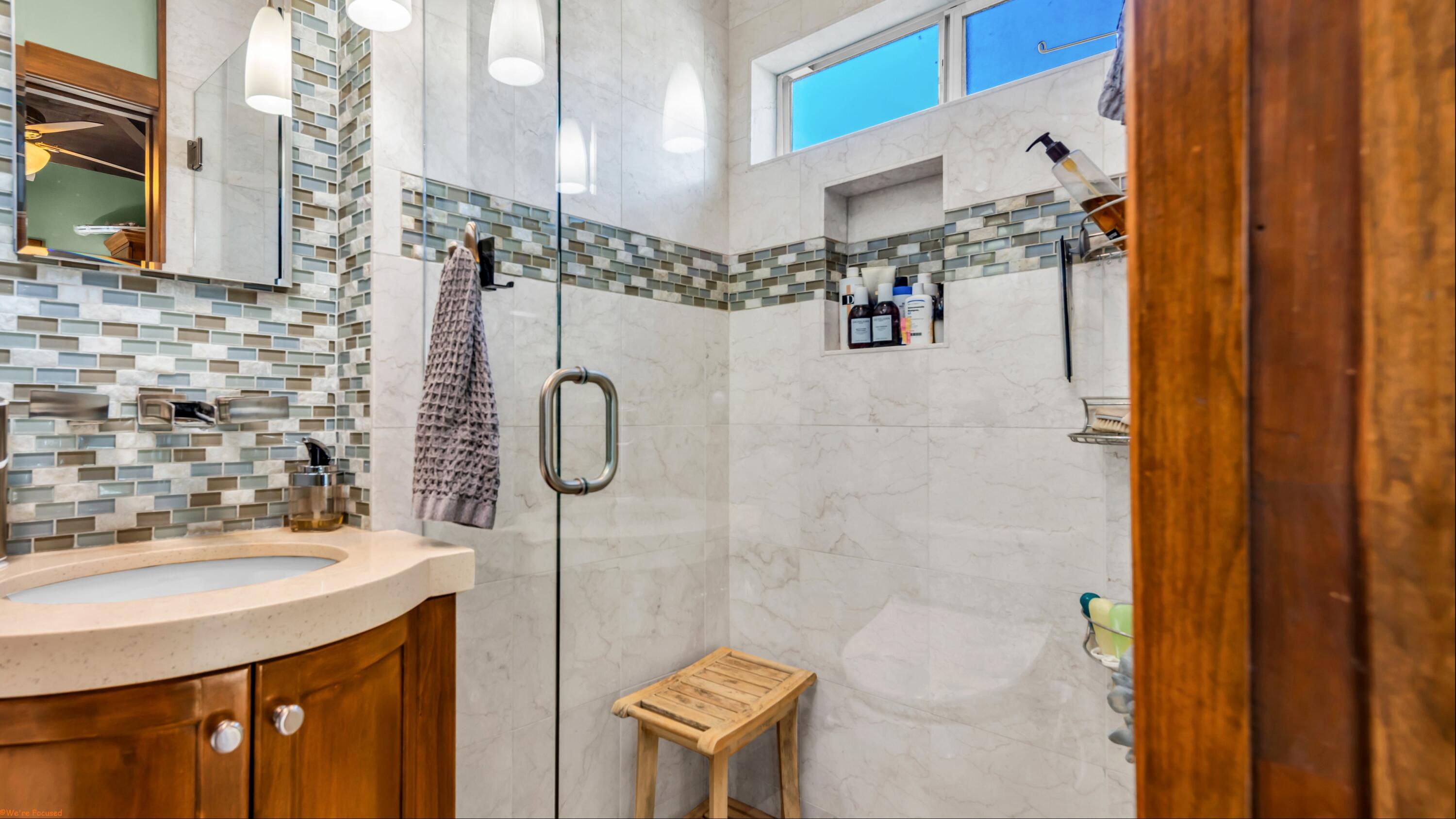 80501 Ave 48, Unit 22 Indio, CA 92201 - Photo 15 of 26 a bathroom with a sink and mirror