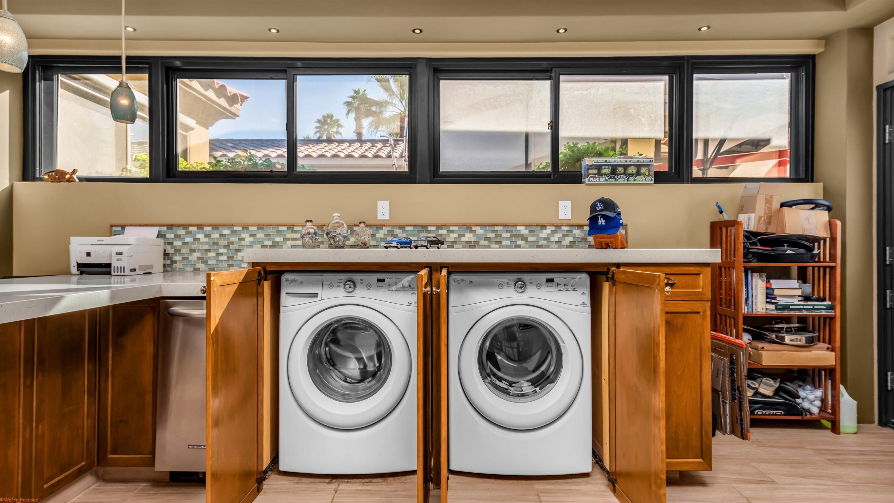 80501 Ave 48, Unit 22 Indio, CA 92201 - Photo 6 of 26 a utility room with dryer and washer