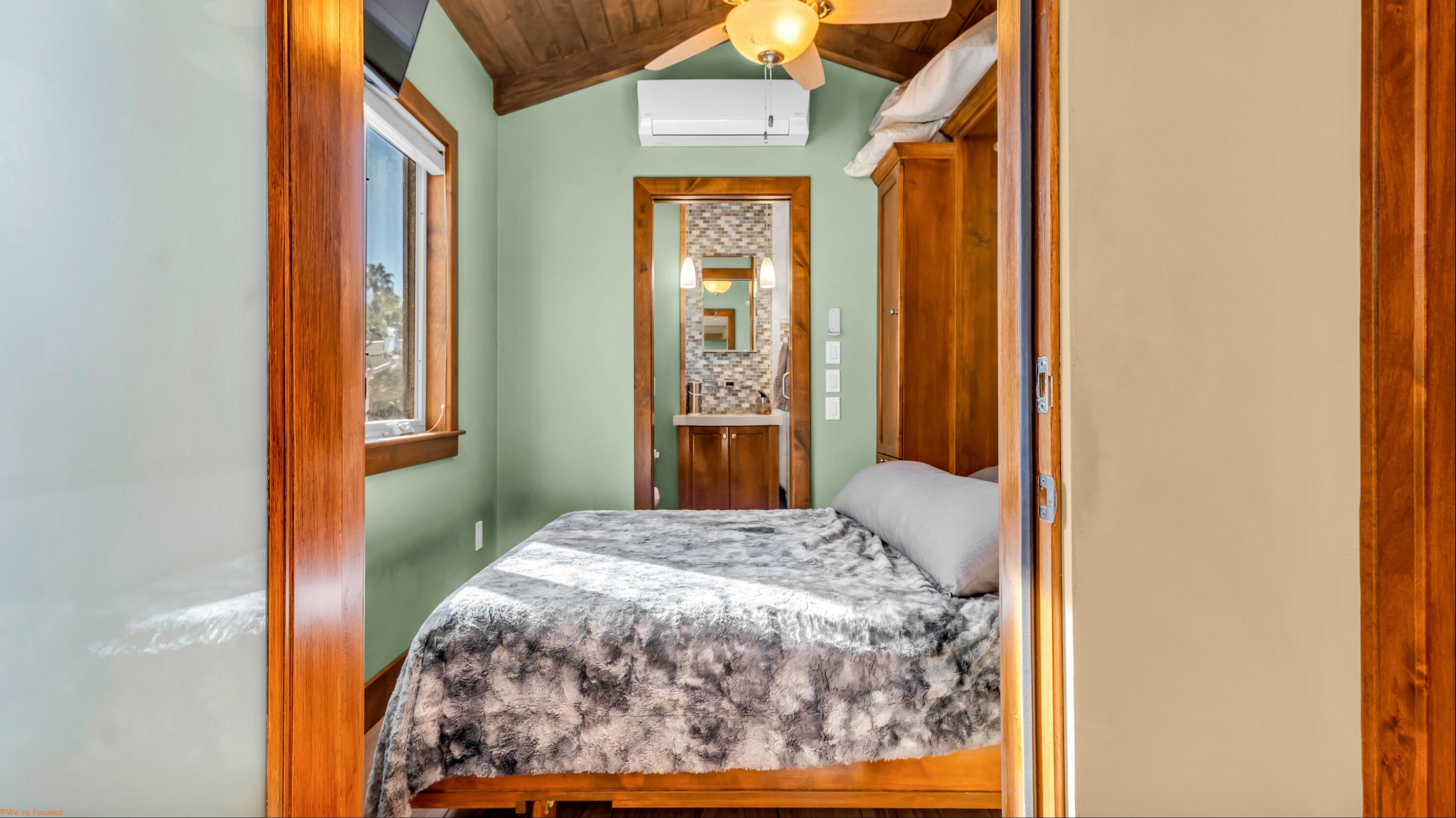 80501 Ave 48, Unit 22 Indio, CA 92201 - Photo 7 of 26 a bedroom with a bed and a window