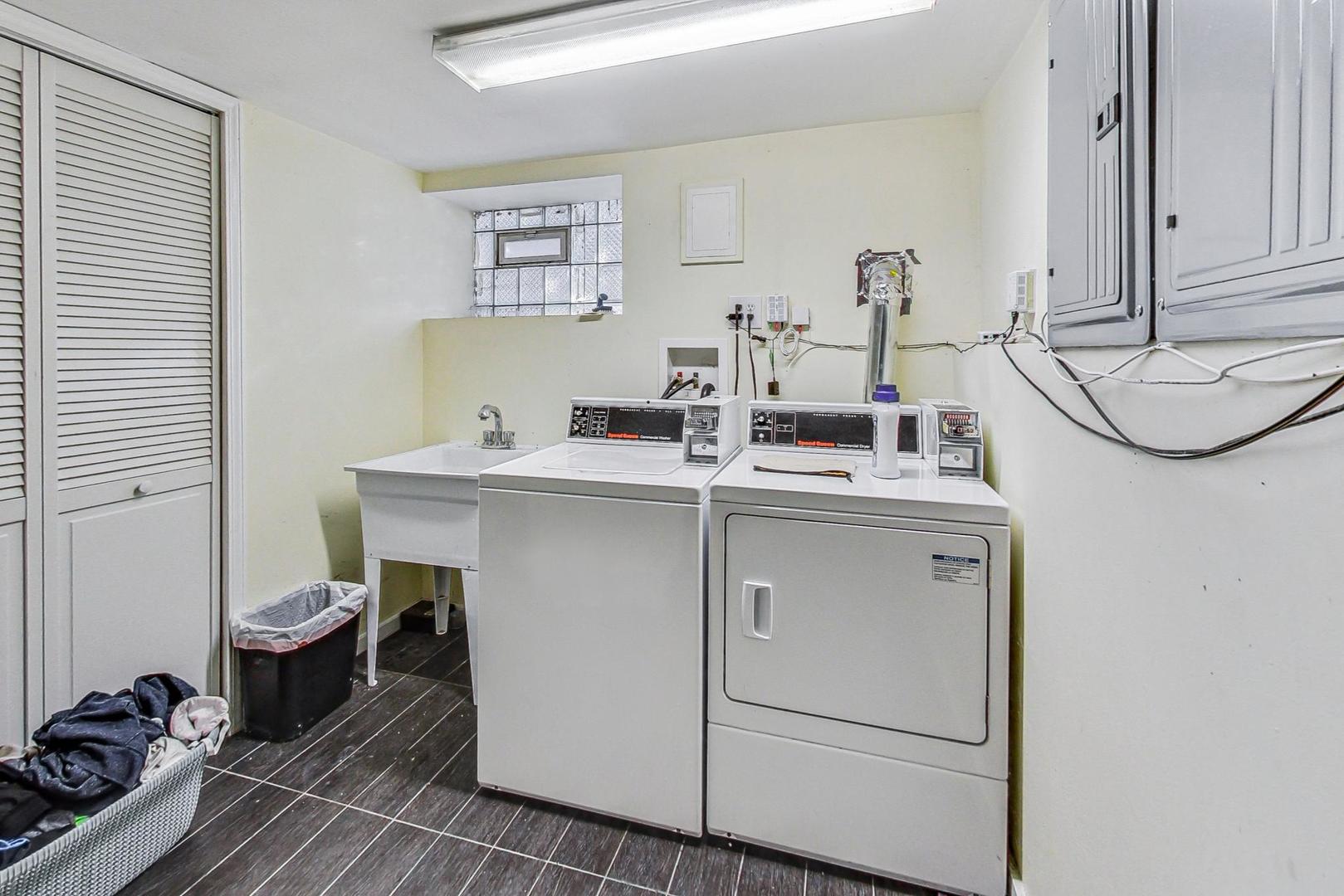 2700 North Artesian Avenue, Unit 1 Chicago, IL 60647 - Photo 10 of 11 a utility room with sink dryer and washer