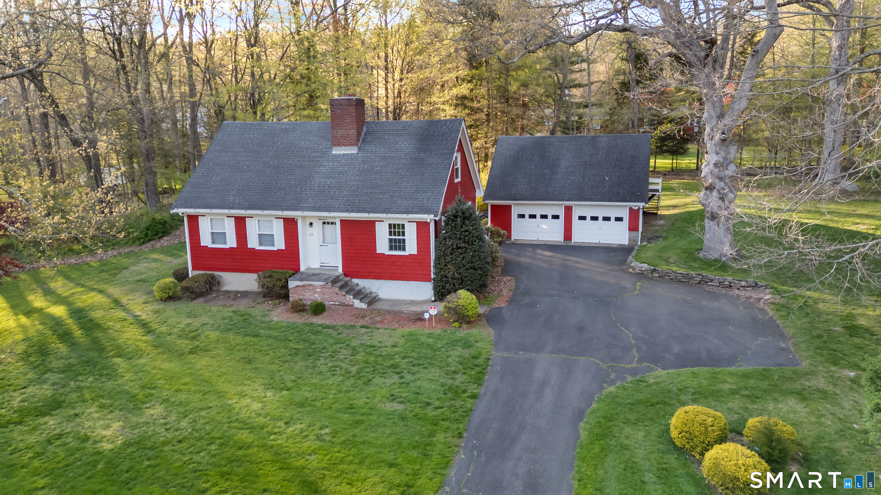 27 Valley Road Shelton, CT 06484 - Photo 1 of 32 a view of a house with a yard