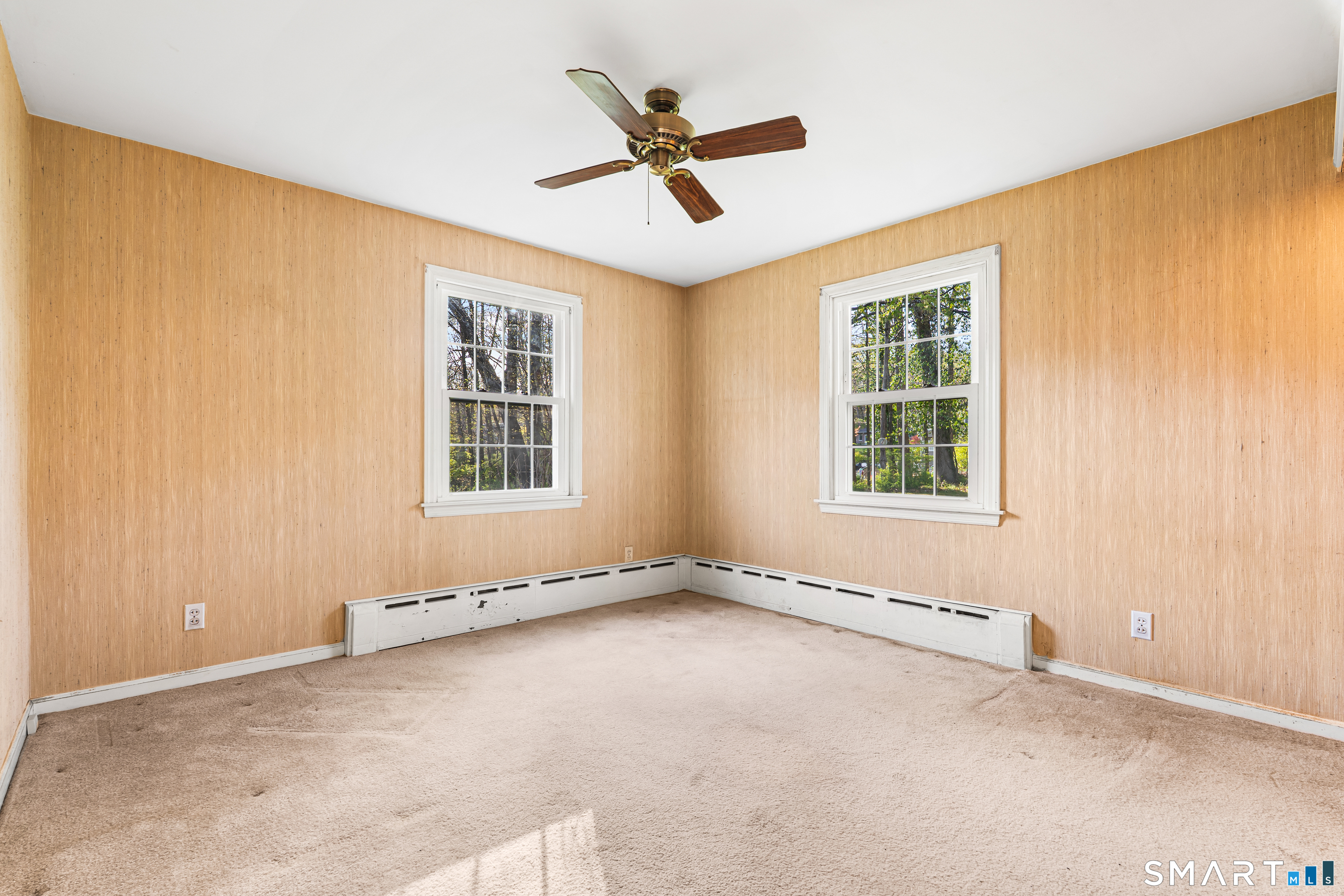 27 Valley Road Shelton, CT 06484 - Photo 11 of 32 an empty room with ceiling fan and windows