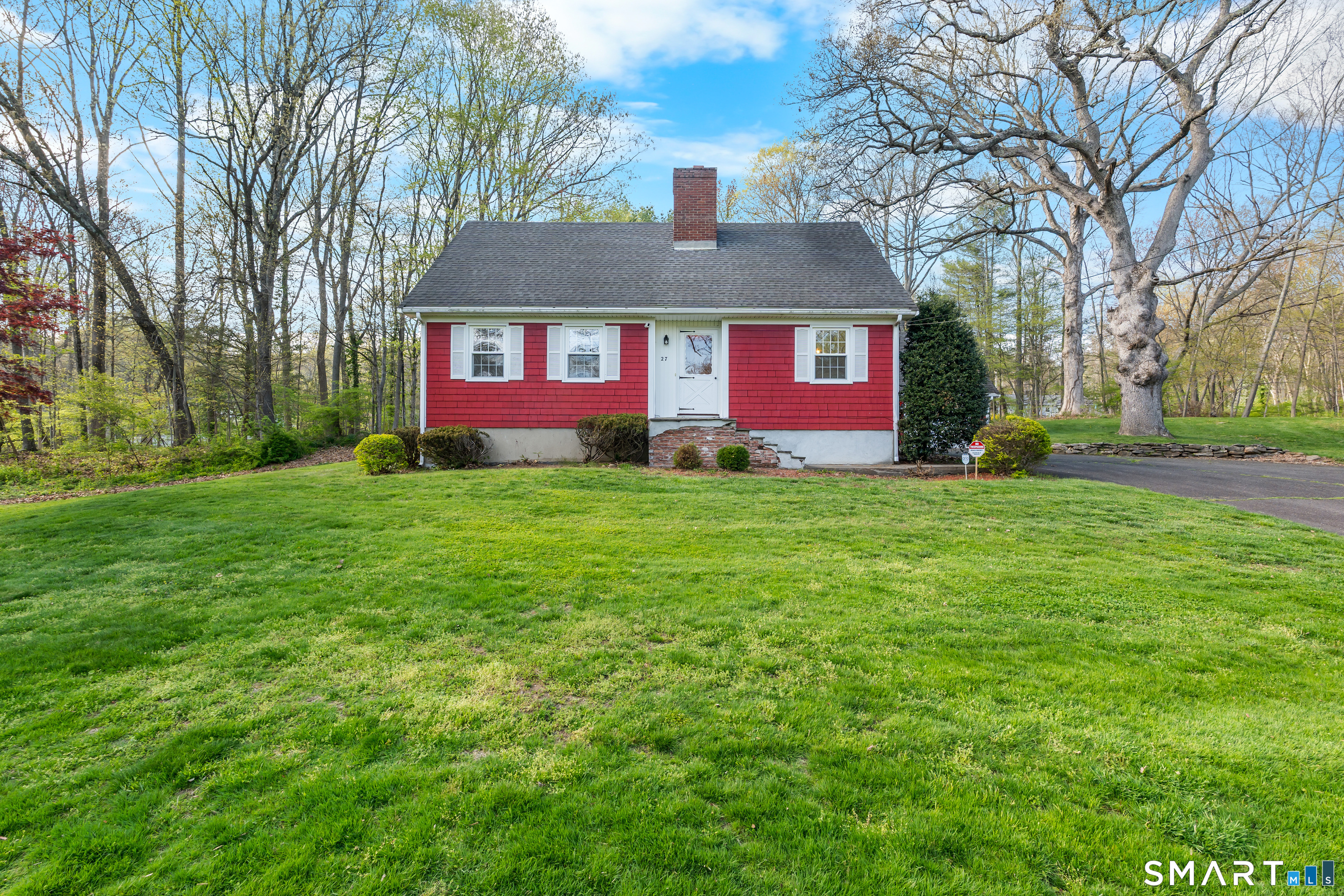 27 Valley Road Shelton, CT 06484 - Photo 2 of 32 a view of a house with a yard