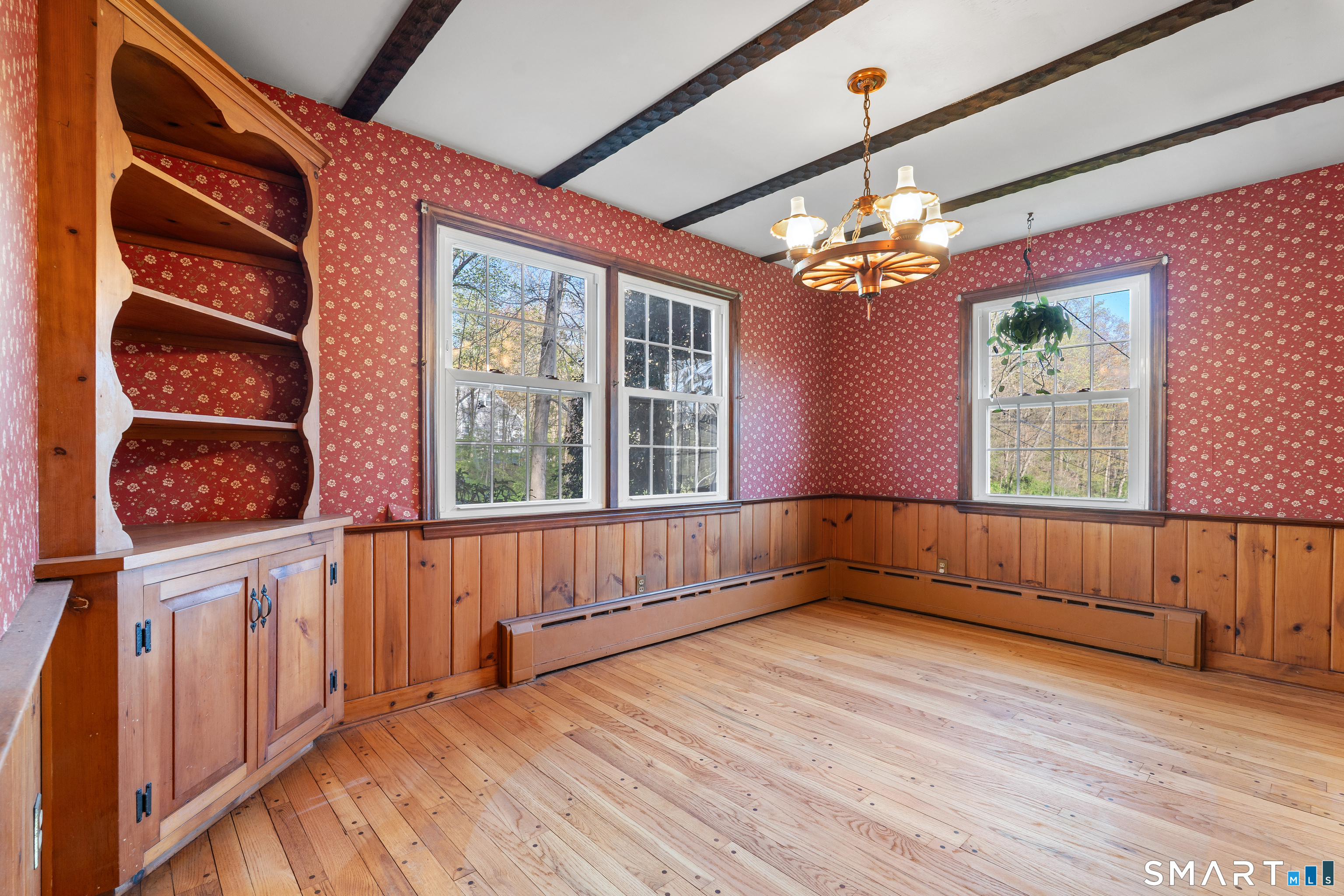 27 Valley Road Shelton, CT 06484 - Photo 9 of 32 a view of entryway with wooden floor and chandelier