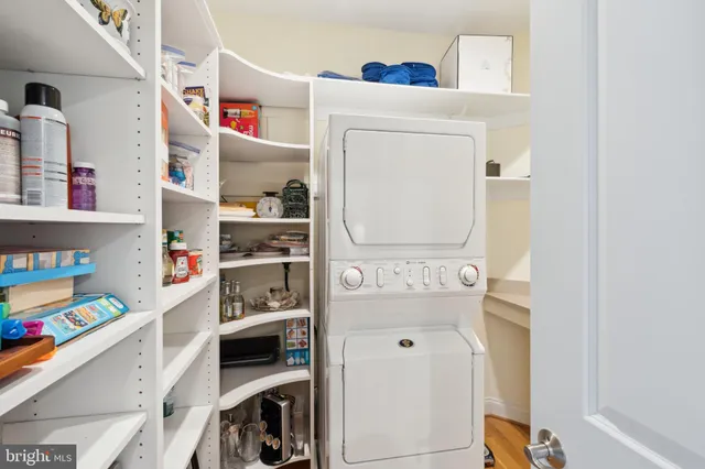 a view of multiple houses with a street