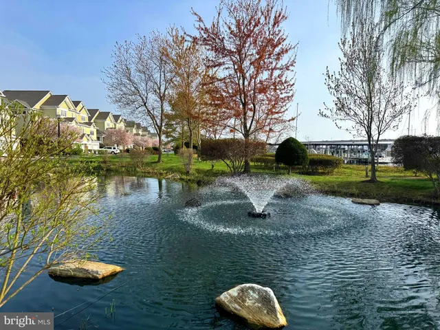 a bedroom with a bed and a chair