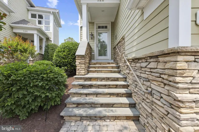 a bathroom with a double vanity sink mirror and shower