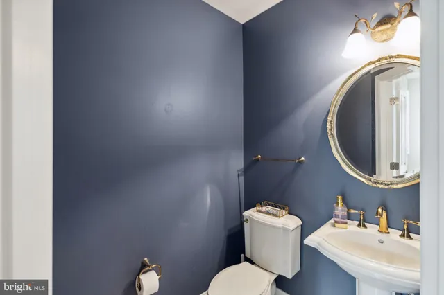 a aerial view of a residential apartment building with a yard