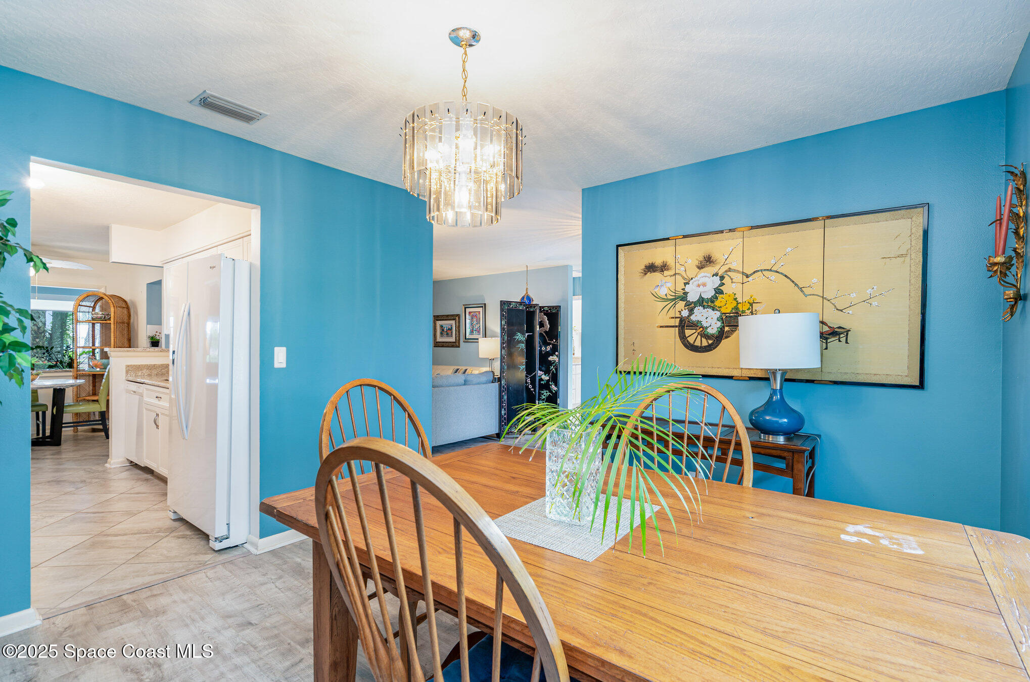 1372 Independence Avenue Melbourne, FL 32940 - Photo 7 of 38 Dining room to kitchen