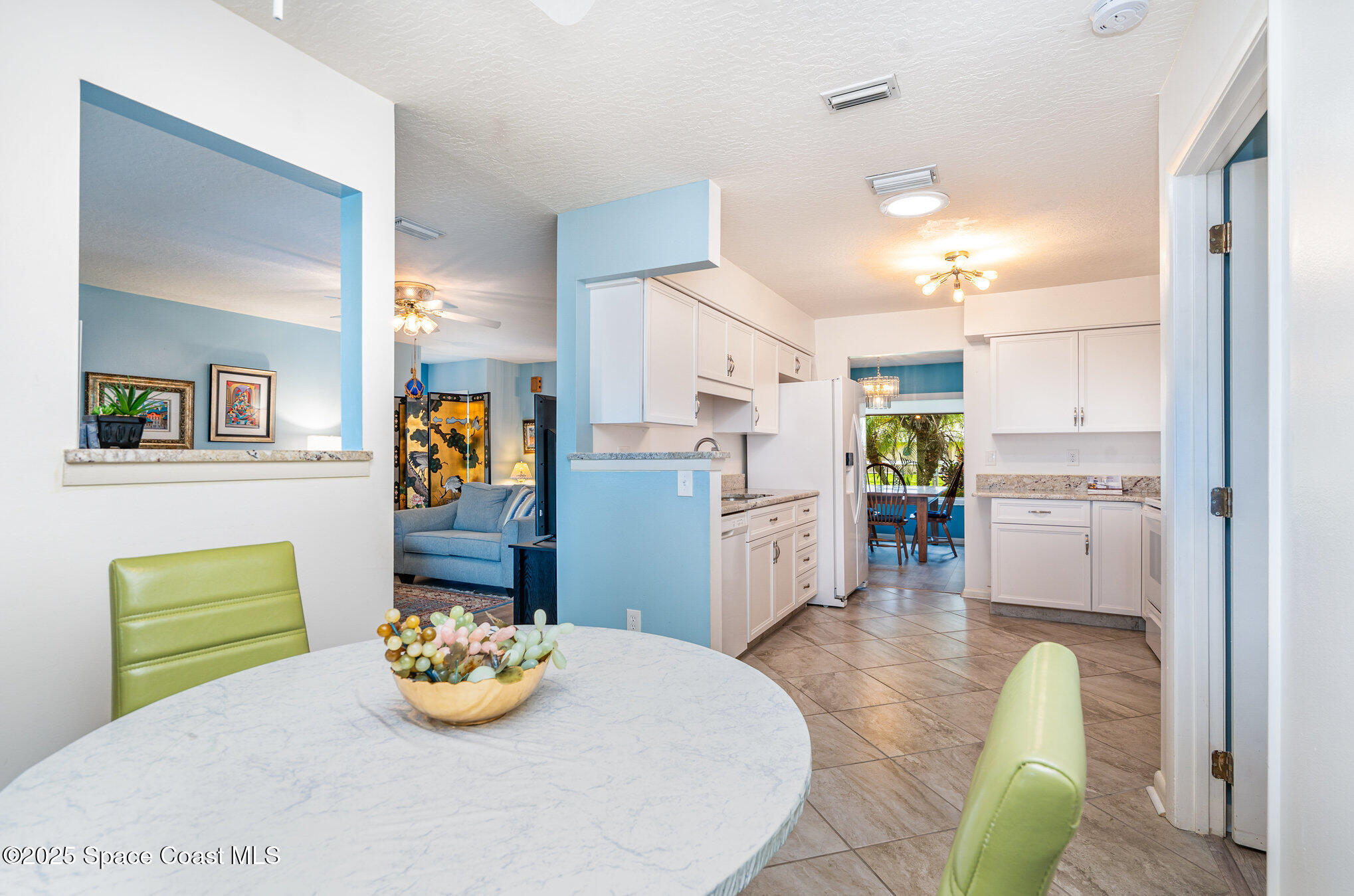 1372 Independence Avenue Melbourne, FL 32940 - Photo 9 of 38 Breakfast Nook to kitchen