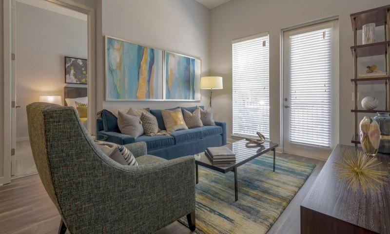 6400 Blue Stone Road, Unit 4018 Sandy Springs, GA 30328 - Photo 10 of 25 a living room with furniture and a large window