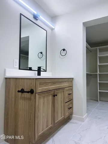 a bathroom with a shower and toilet