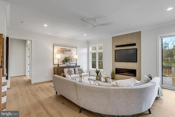 a kitchen with stainless steel appliances a stove a sink and cabinets
