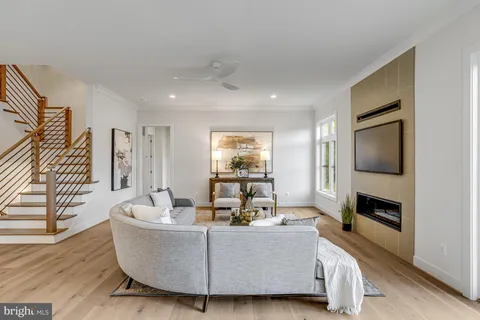 a bedroom with a bed and flat screen tv