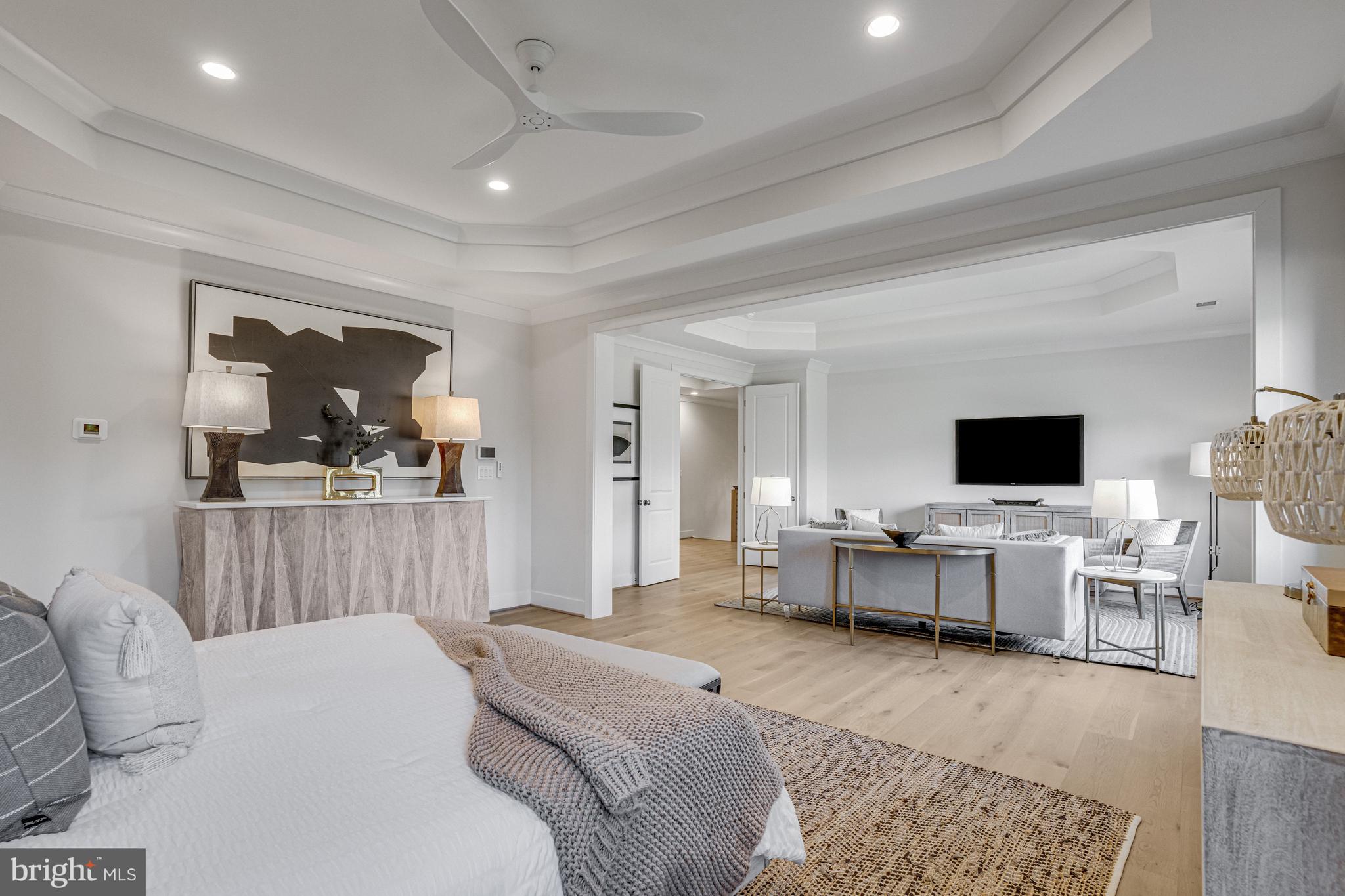1002 Springvale Road Great Falls, VA 22066 - Photo 47 of 73 a living room with furniture and a flat screen tv