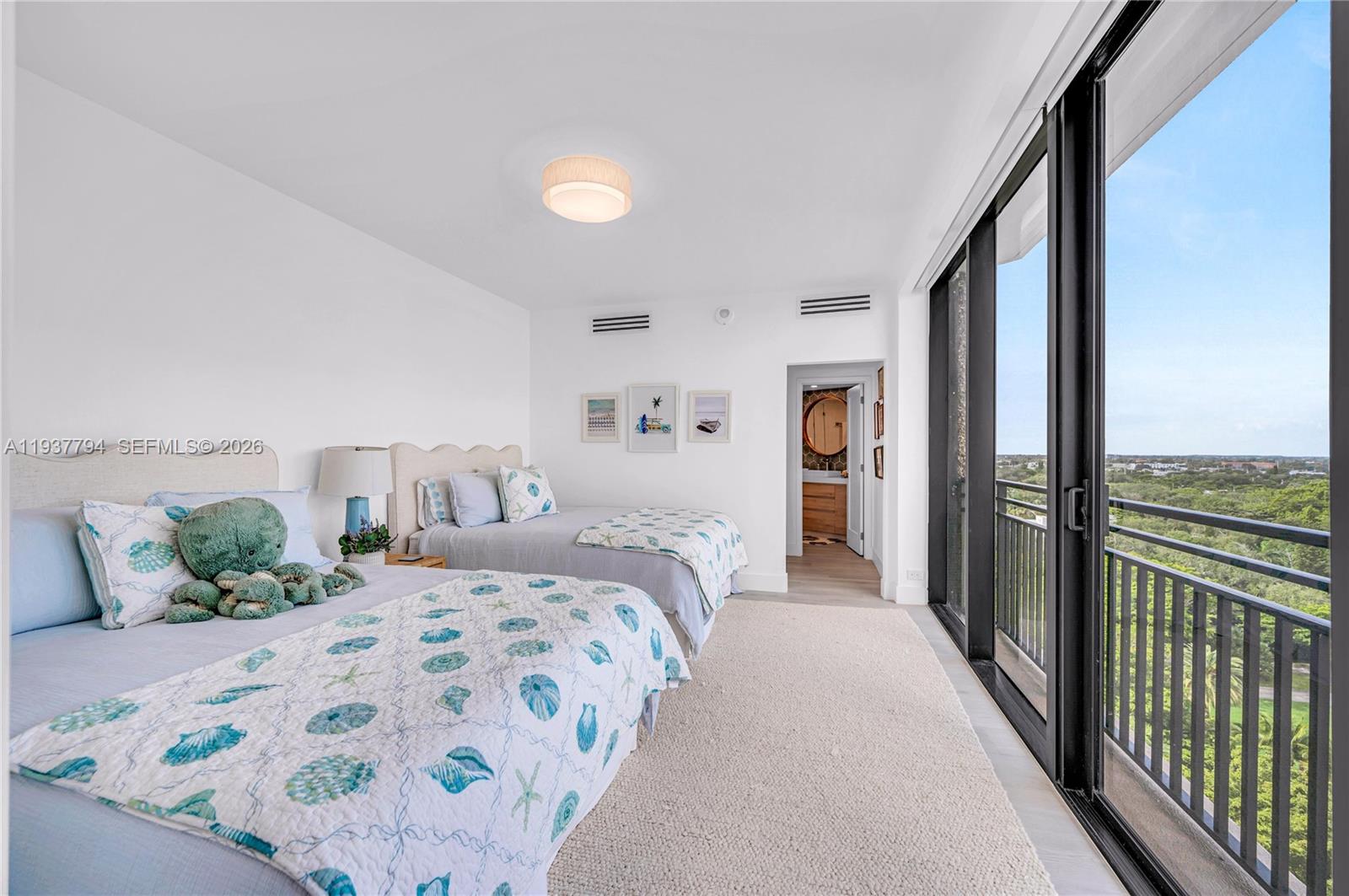 720 Northeast 69th Street, Unit 12W Miami, FL 33138 - Photo 20 of 28 Second Bedroom