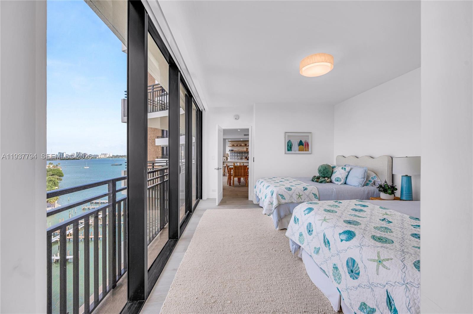 720 Northeast 69th Street, Unit 12W Miami, FL 33138 - Photo 22 of 28 Second Bedroom View