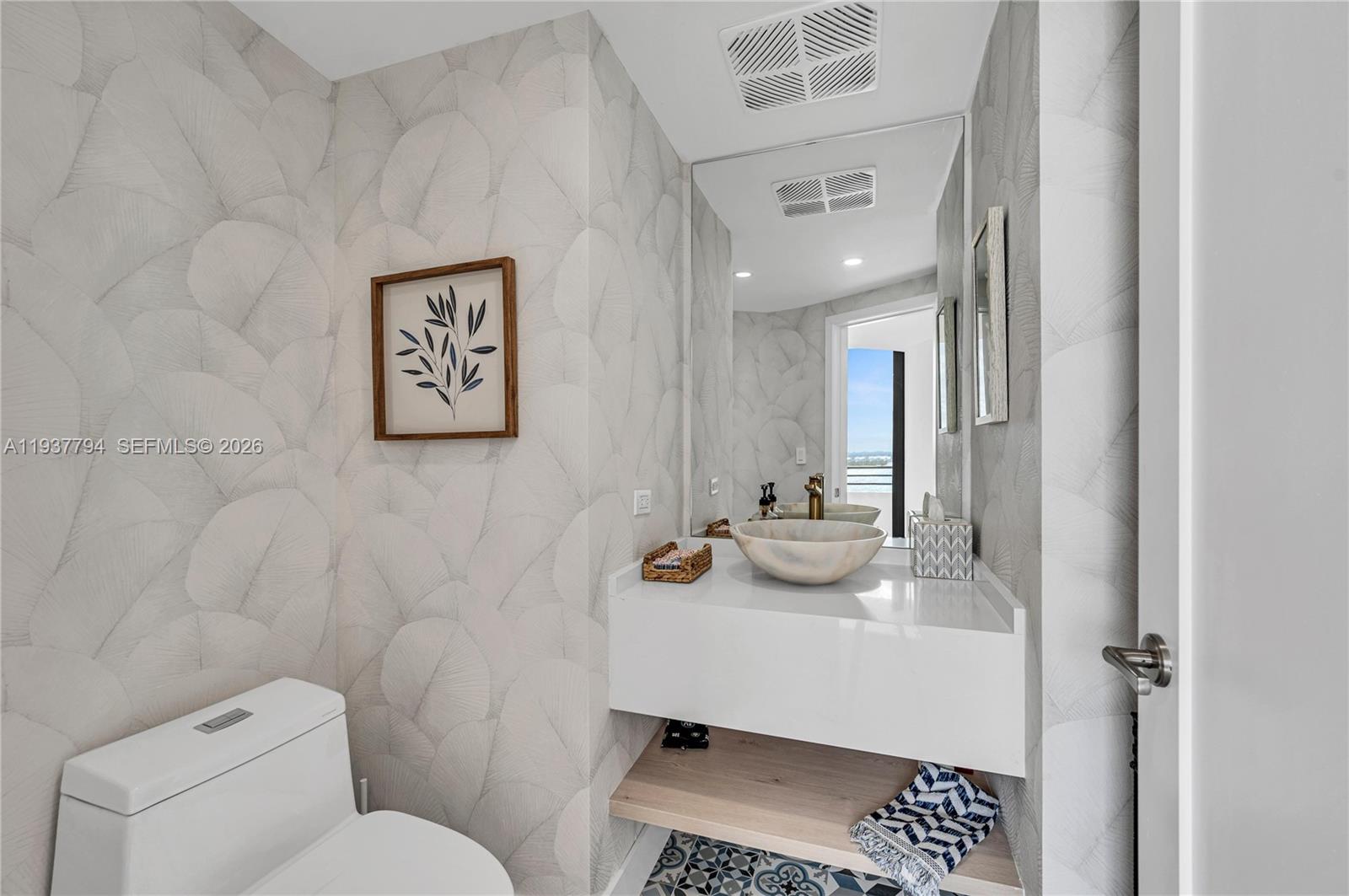 720 Northeast 69th Street, Unit 12W Miami, FL 33138 - Photo 7 of 28 Powder Room