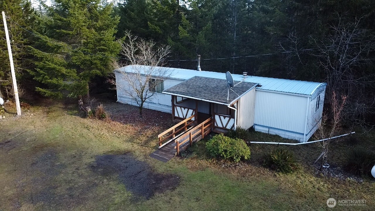 220 West Buck Prairie Road Elma, WA 98541 - Photo 2 of 30 a view of a house with a yard