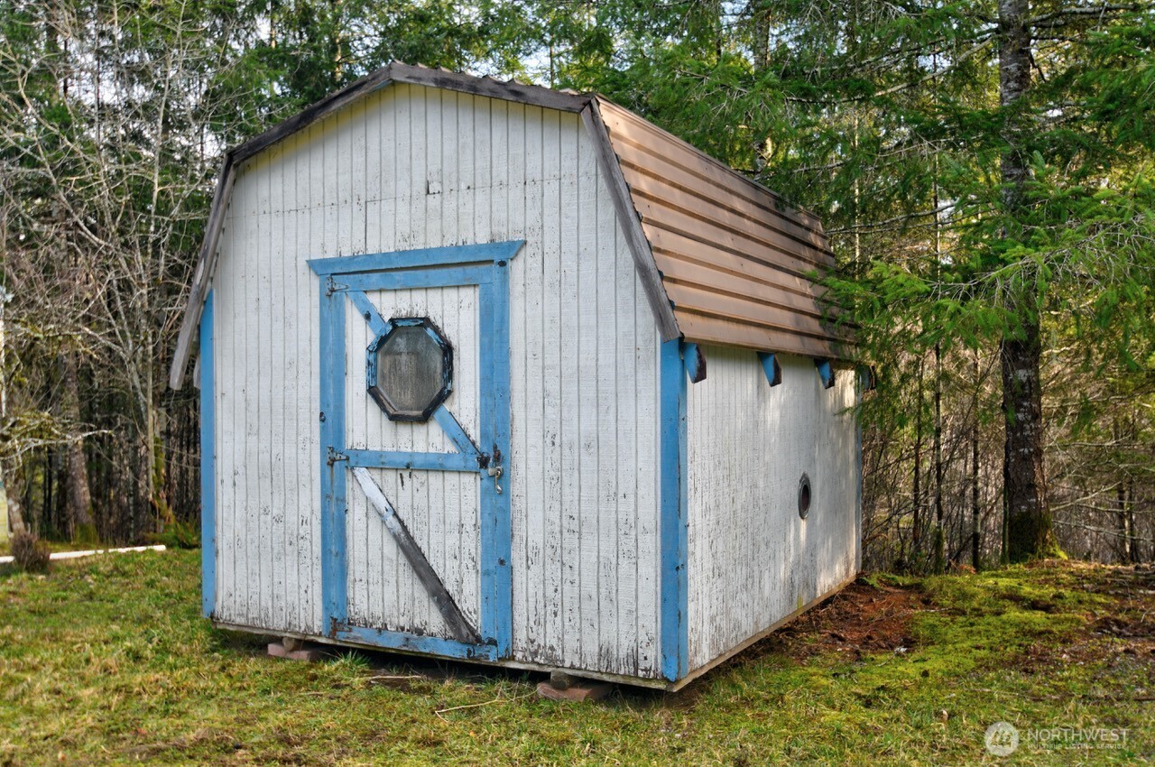 220 West Buck Prairie Road Elma, WA 98541 - Photo 30 of 30 a front view of a house with garden