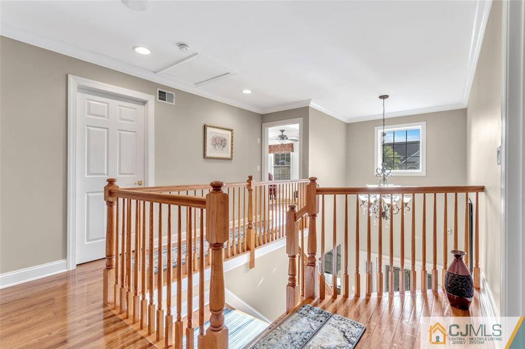87 Willocks Circle Somerset, NJ 08873 - Photo 15 of 31 a view of a hallway with windows and stairs