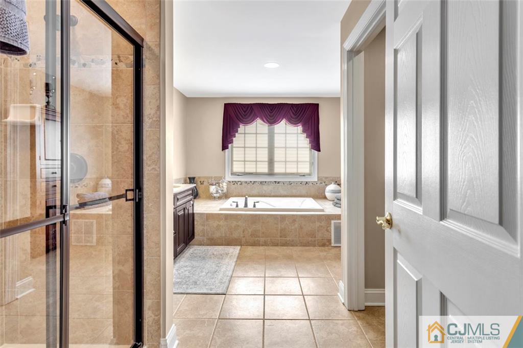 87 Willocks Circle Somerset, NJ 08873 - Photo 18 of 31 a view of bathroom with bathtub and shower