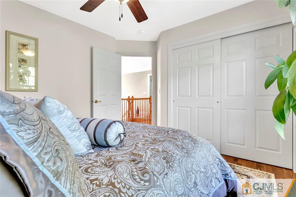 87 Willocks Circle Somerset, NJ 08873 - Photo 21 of 31 a bedroom with a bed and a window