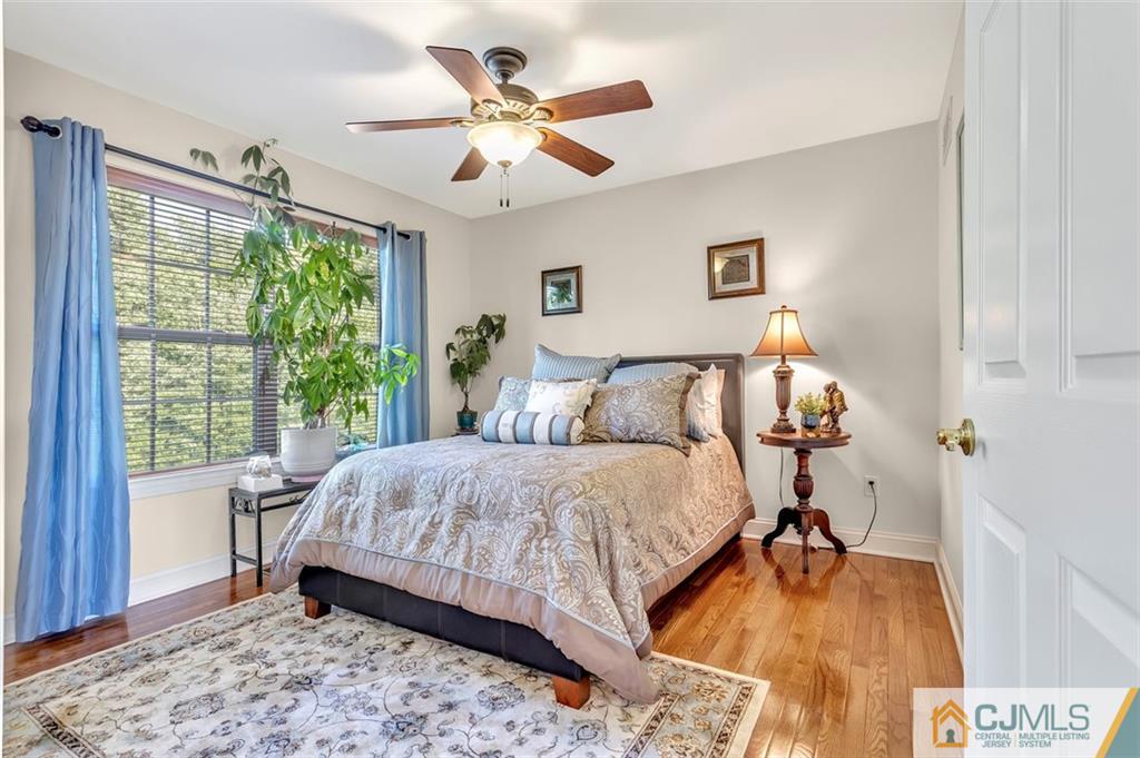 87 Willocks Circle Somerset, NJ 08873 - Photo 22 of 31 a bed room with a bed and a window
