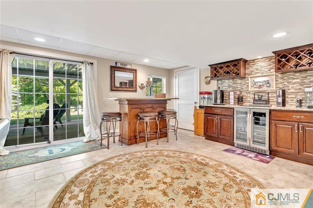 87 Willocks Circle Somerset, NJ 08873 - Photo 28 of 31 a bed room with a bed and a chair