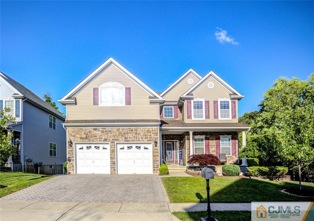 87 Willocks Circle Somerset, NJ 08873 - Photo 3 of 31 a front view of a house with garden