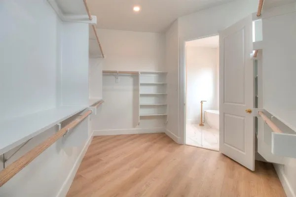 a view of an empty walk in closet