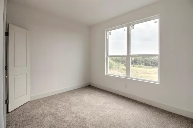a view of a hallway with entryway