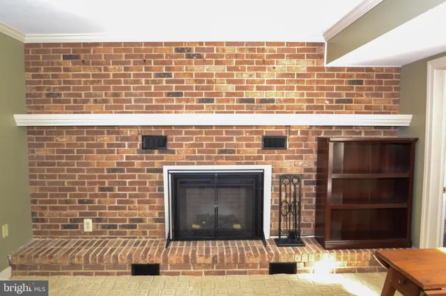 a view of a brick building with many windows