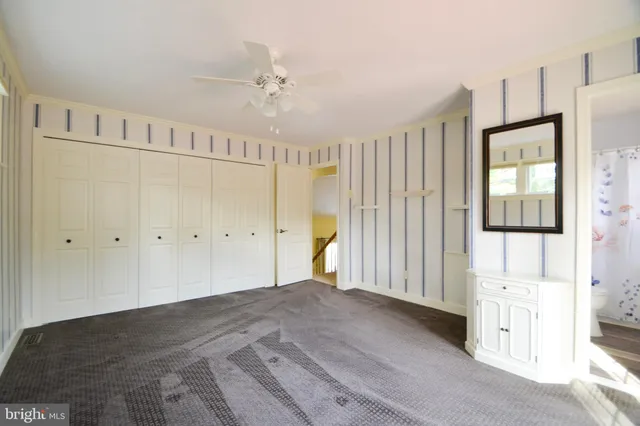 a bathroom with a sink toilet tub and shower