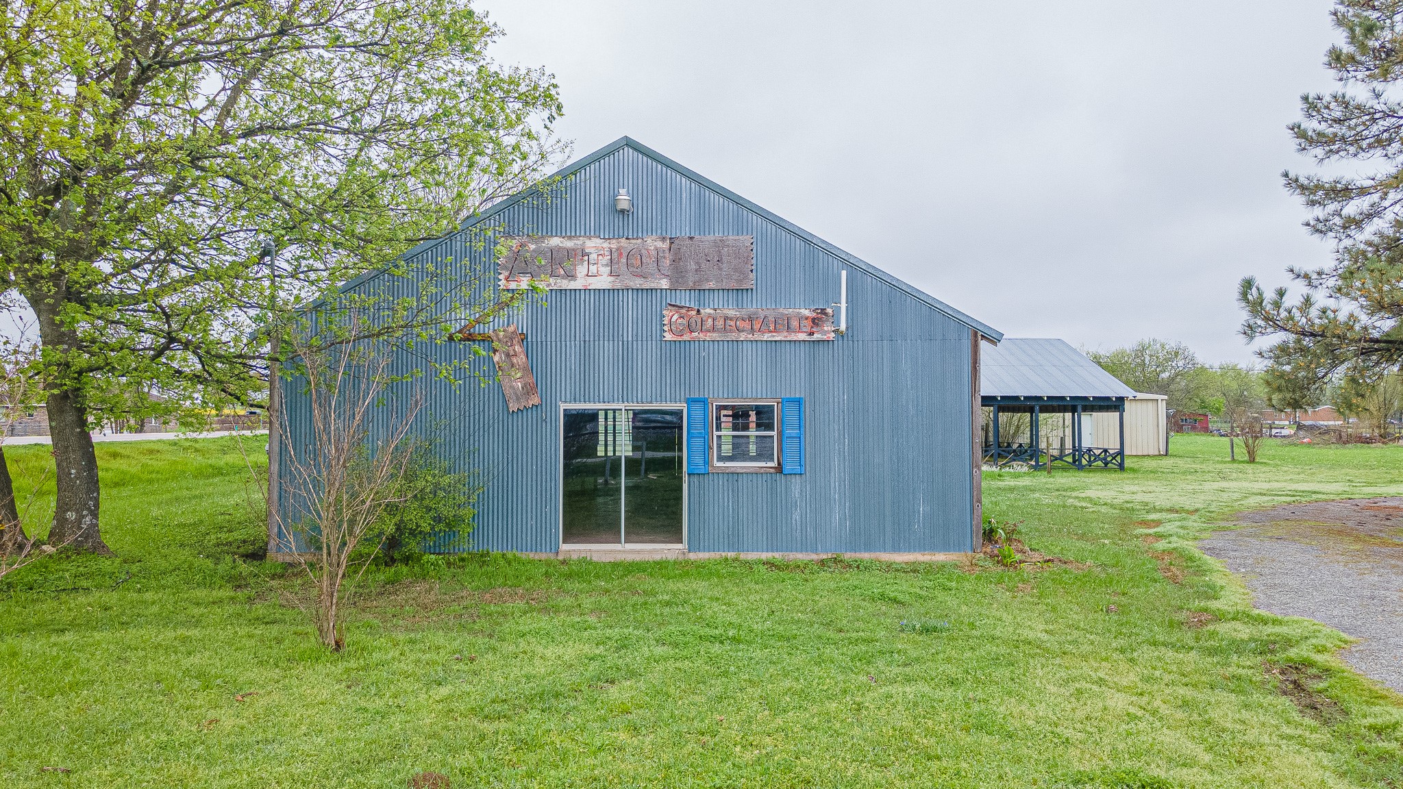 447 North Commerce Street Marquez, TX 77865 - Photo 16 of 27 a front view of house with yard and green space