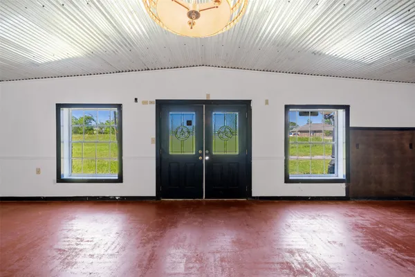 a view of a room with window and wooden floor
