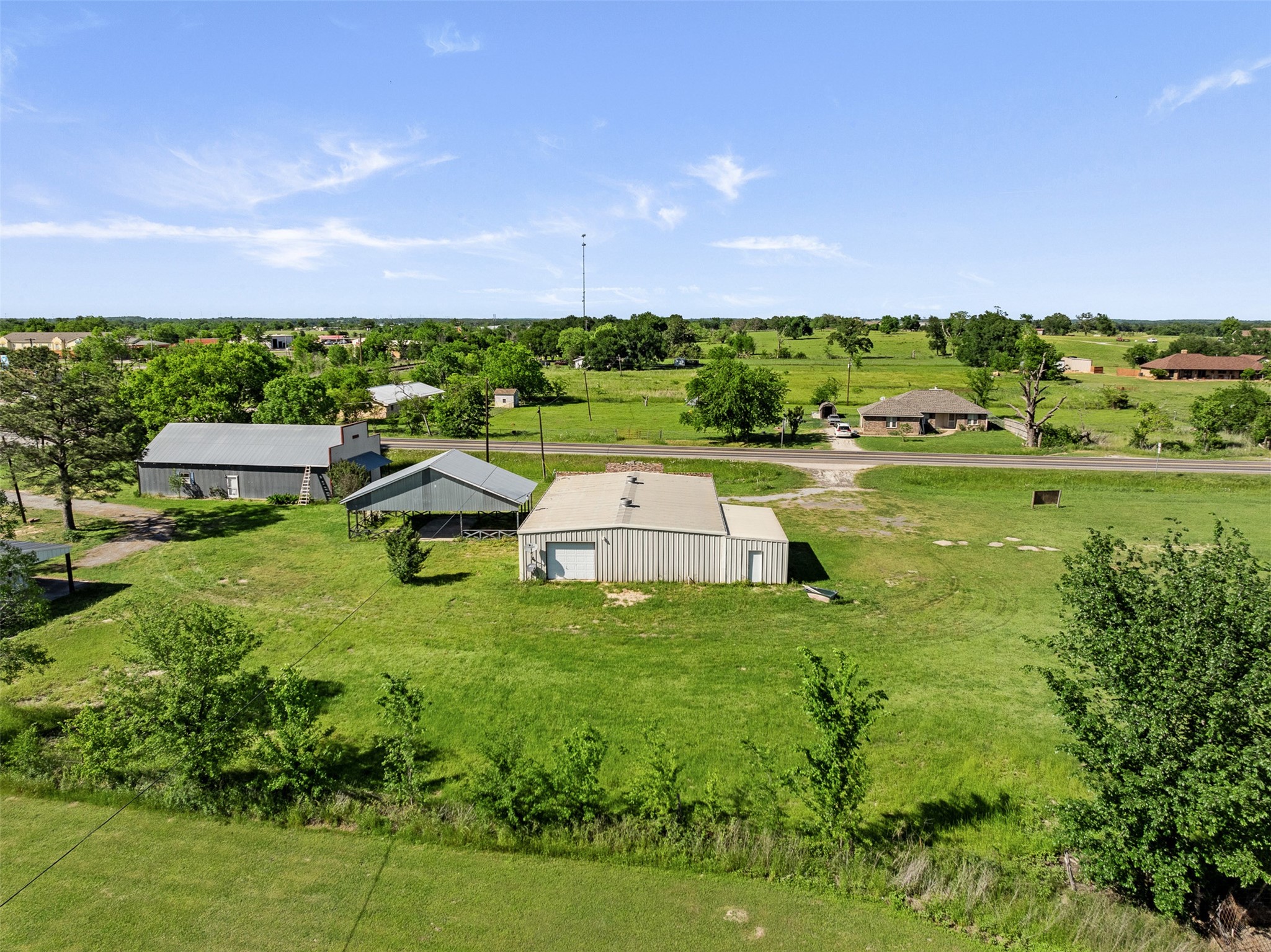 447 North Commerce Street Marquez, TX 77865 - Photo 21 of 27 a swimming pool with outdoor seating and yard