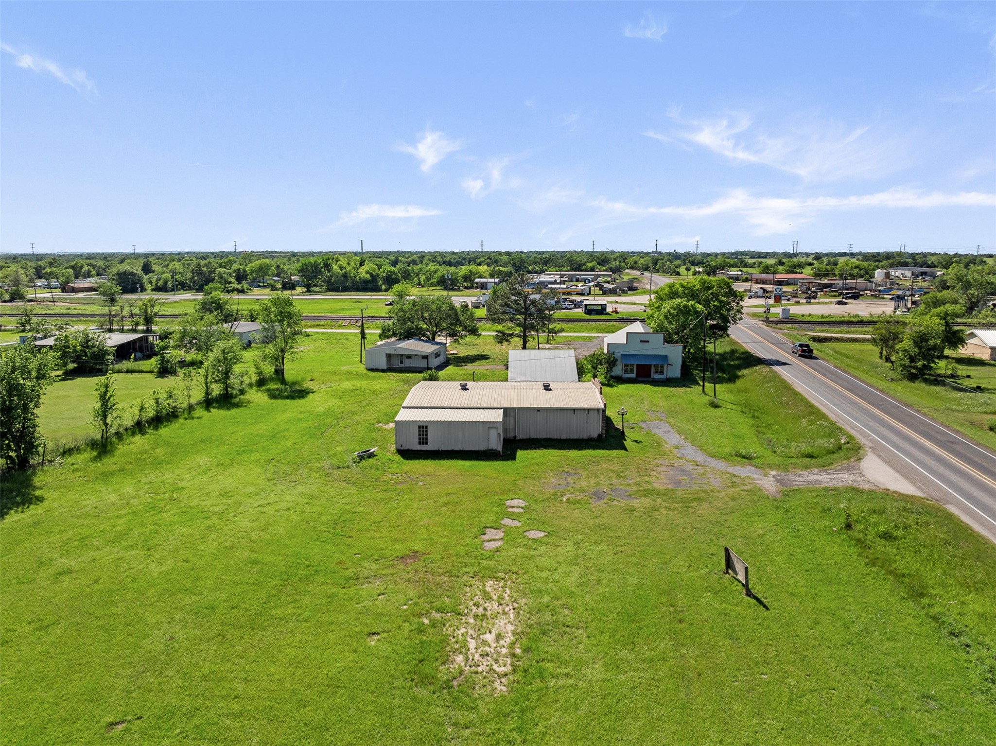 447 North Commerce Street Marquez, TX 77865 - Photo 27 of 27 a view of a garden with lawn chairs