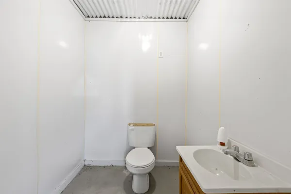 a bathroom with a sink and a toilet