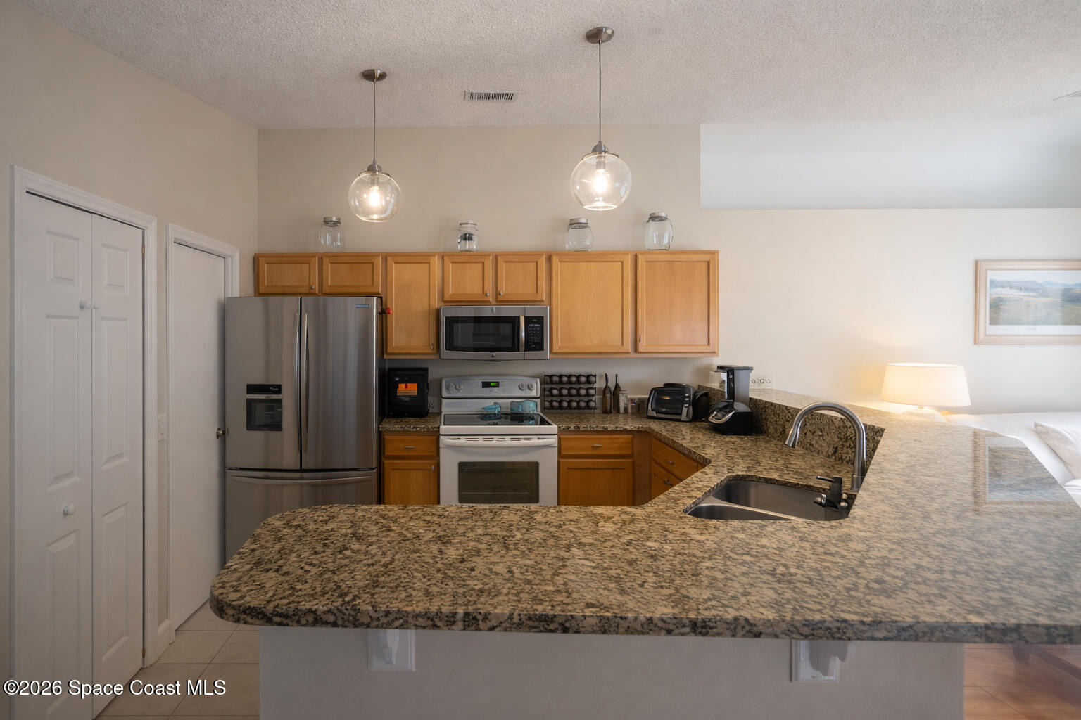 3312 Echo Ridge Place Cocoa, FL 32926 - Photo 8 of 18 bartop peek
