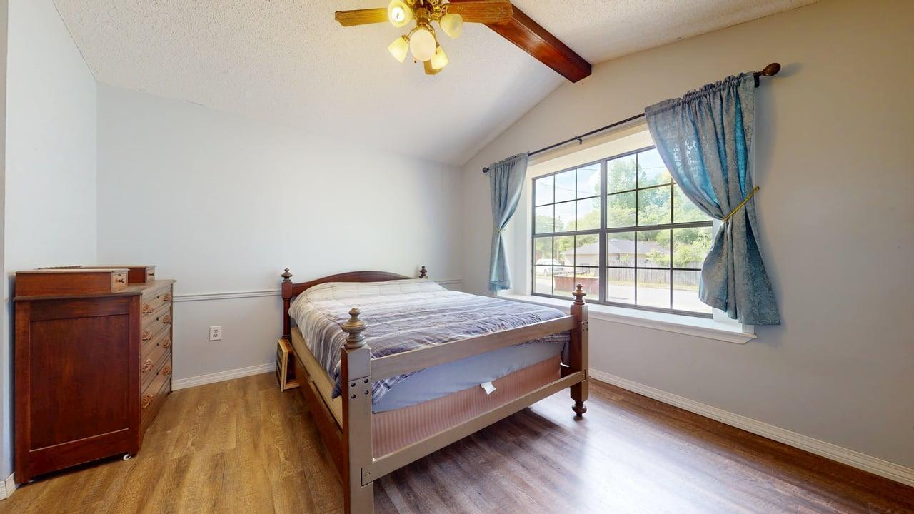 118 Fairoaks Drive Crestview, FL 32539 - Photo 11 of 23 a bed sitting in a bedroom next to a window
