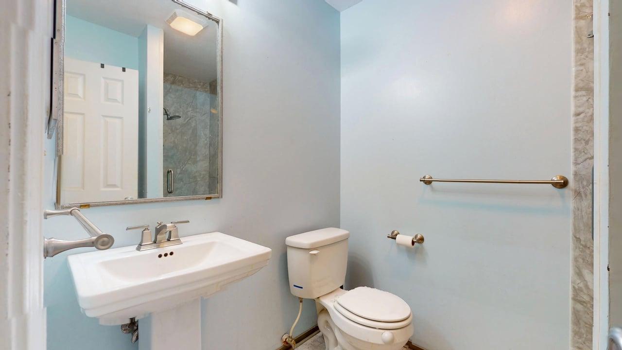 118 Fairoaks Drive Crestview, FL 32539 - Photo 13 of 23 a bathroom with a sink a toilet and a mirror