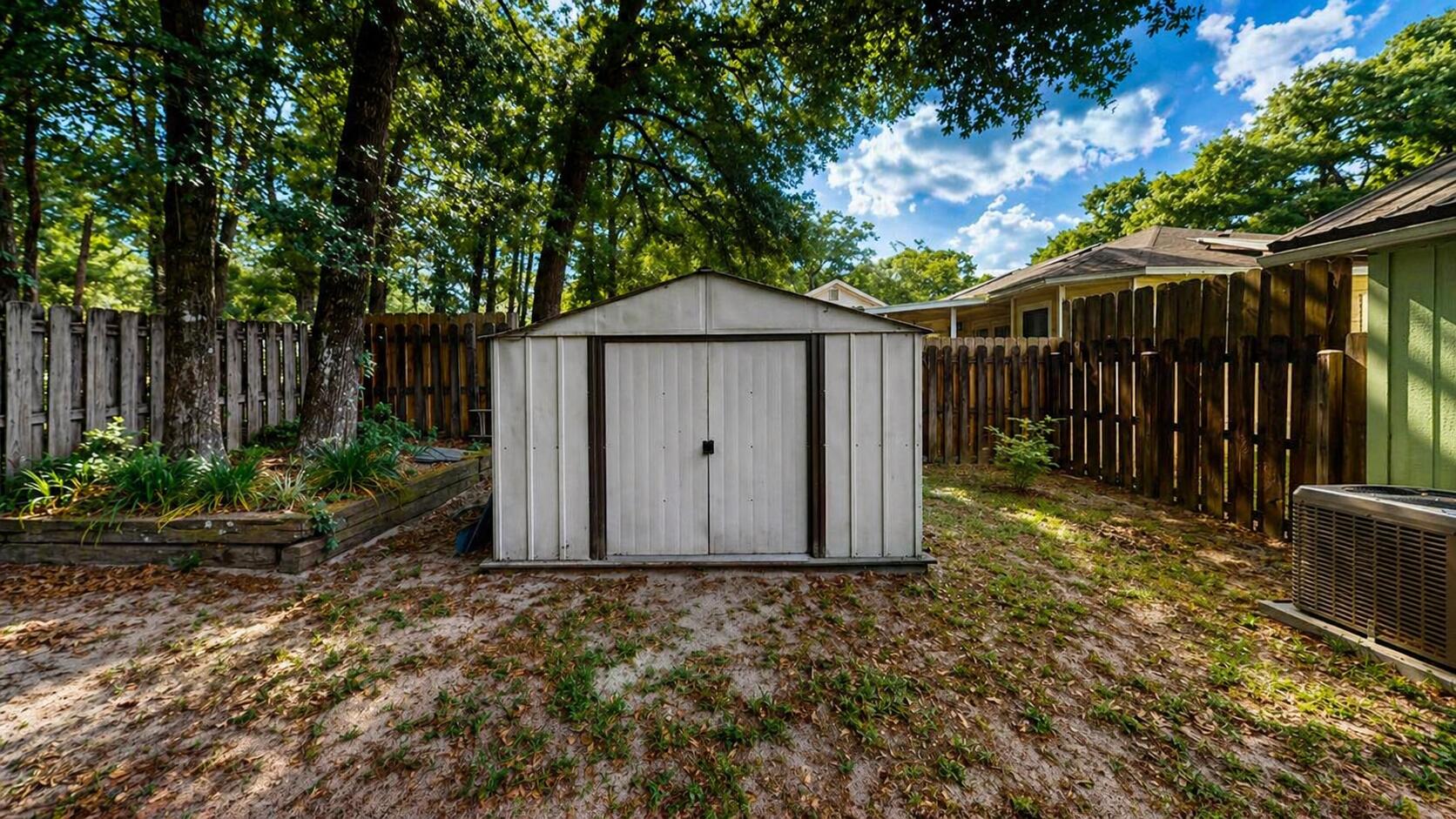 118 Fairoaks Drive Crestview, FL 32539 - Photo 20 of 23 a house with trees in the background