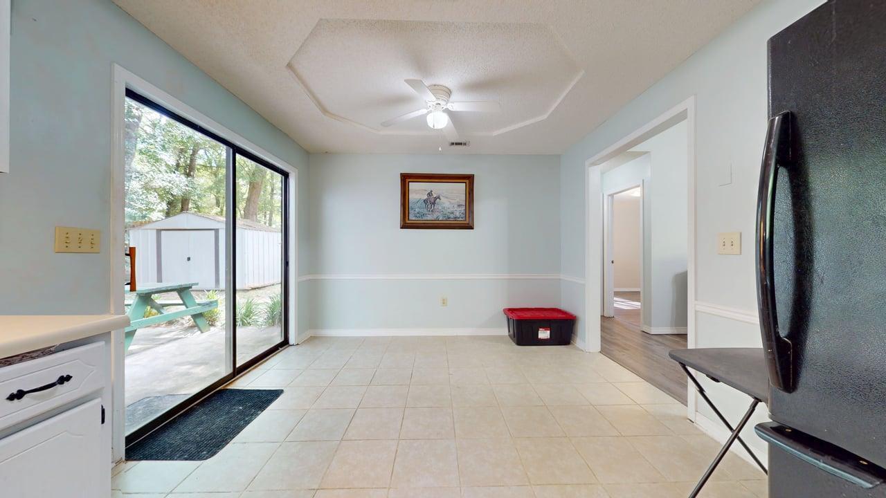 118 Fairoaks Drive Crestview, FL 32539 - Photo 10 of 23 a bedroom with a bed and a large window