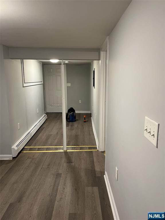 84-86 Main Street, Unit 1 Paterson, NJ 07505 - Photo 7 of 10 an empty room with wooden floor