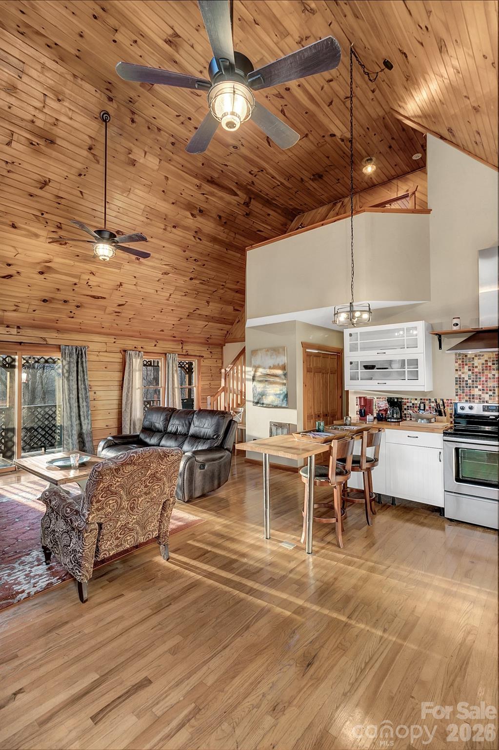 135 Pretty Ridge Maggie Valley, NC 28751 - Photo 14 of 46 a living room with furniture and kitchen view